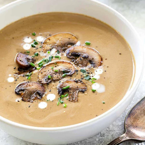 Brown and white mushroom soup